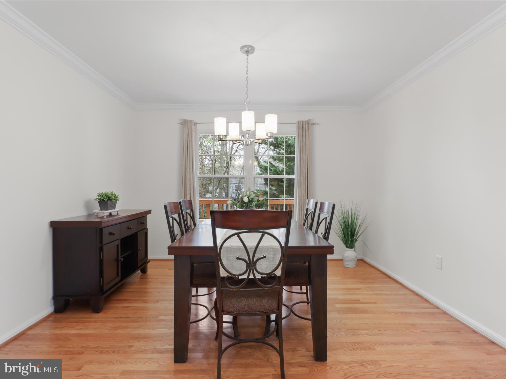 332 Silver Ridge Drive Sterling, VA 20164 - Photo 20 of 53 a view of a dining room with furniture window and wooden floor