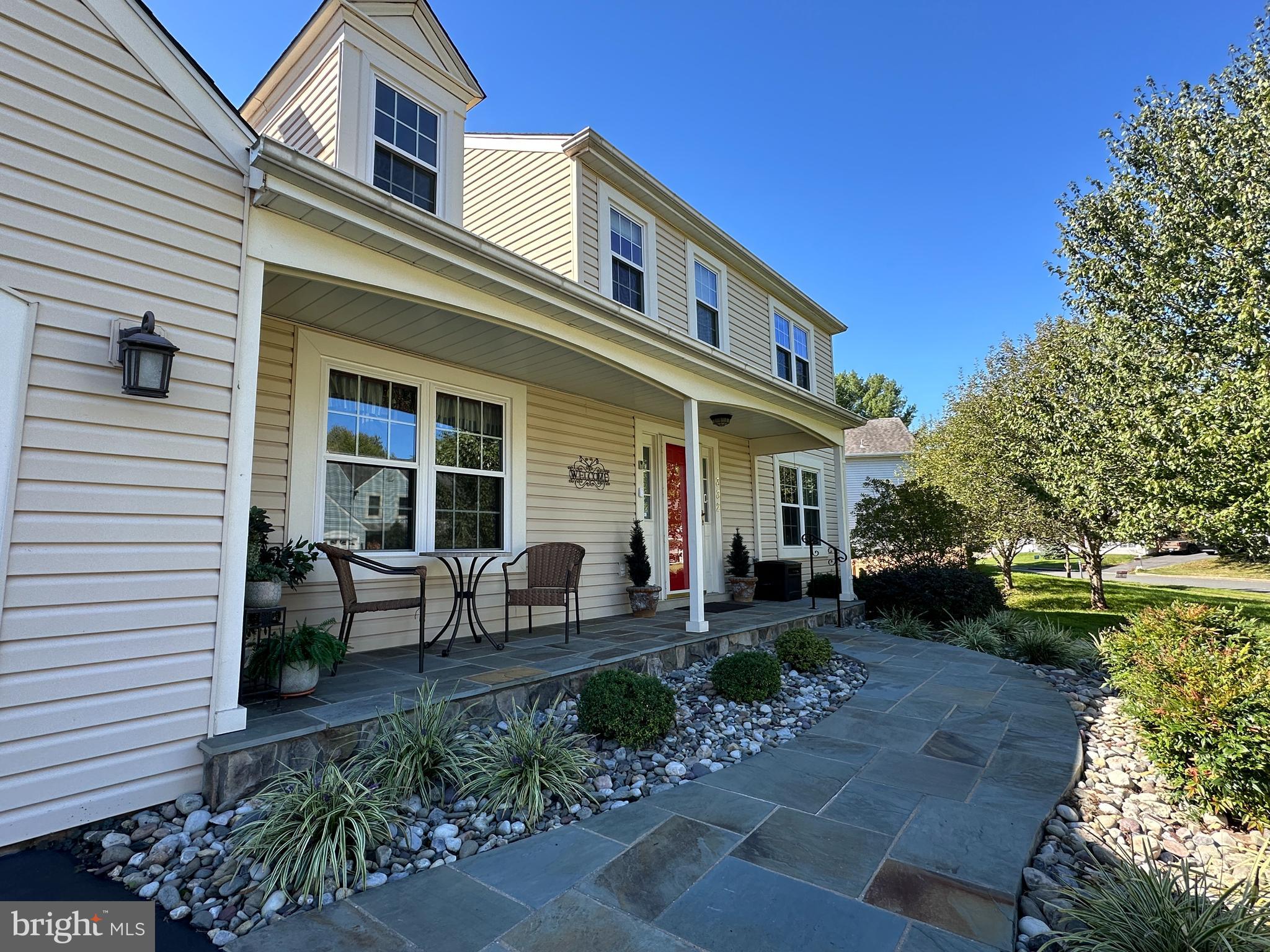 332 Silver Ridge Drive Sterling, VA 20164 - Photo 2 of 53 a front view of house with a garden