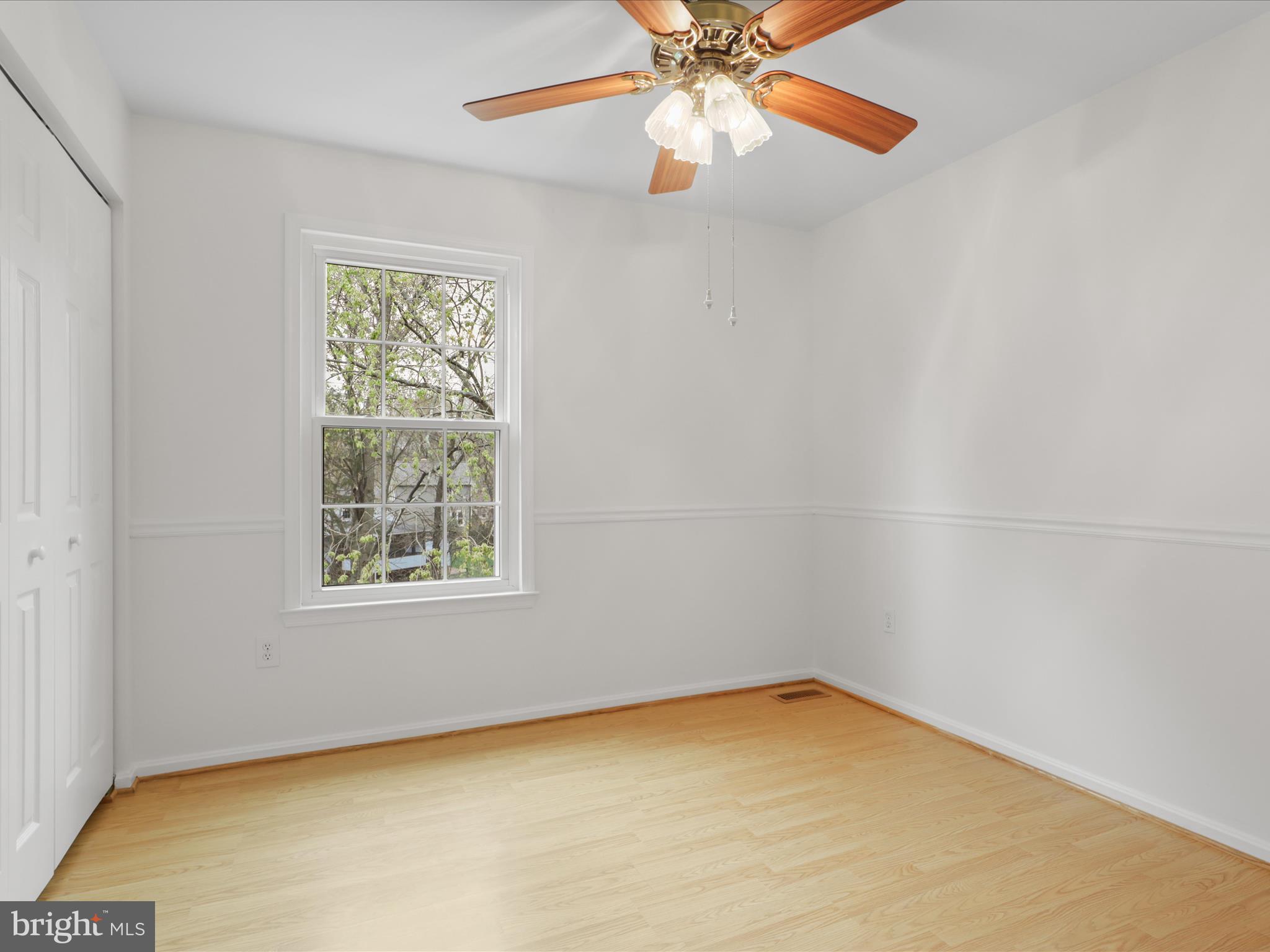 332 Silver Ridge Drive Sterling, VA 20164 - Photo 26 of 53 an empty room with a window and a fan