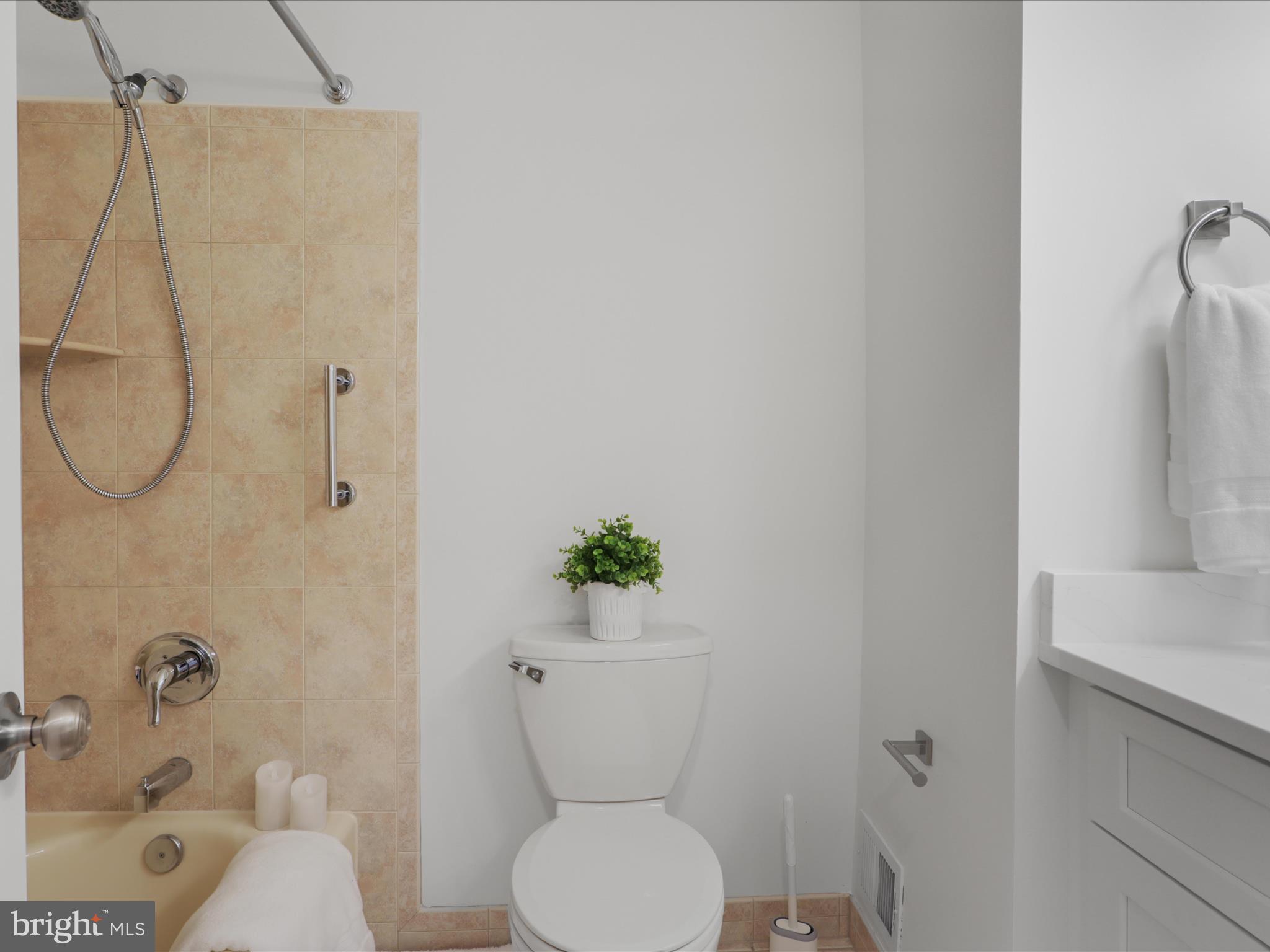 332 Silver Ridge Drive Sterling, VA 20164 - Photo 28 of 53 a bathroom with a toilet sink and shower