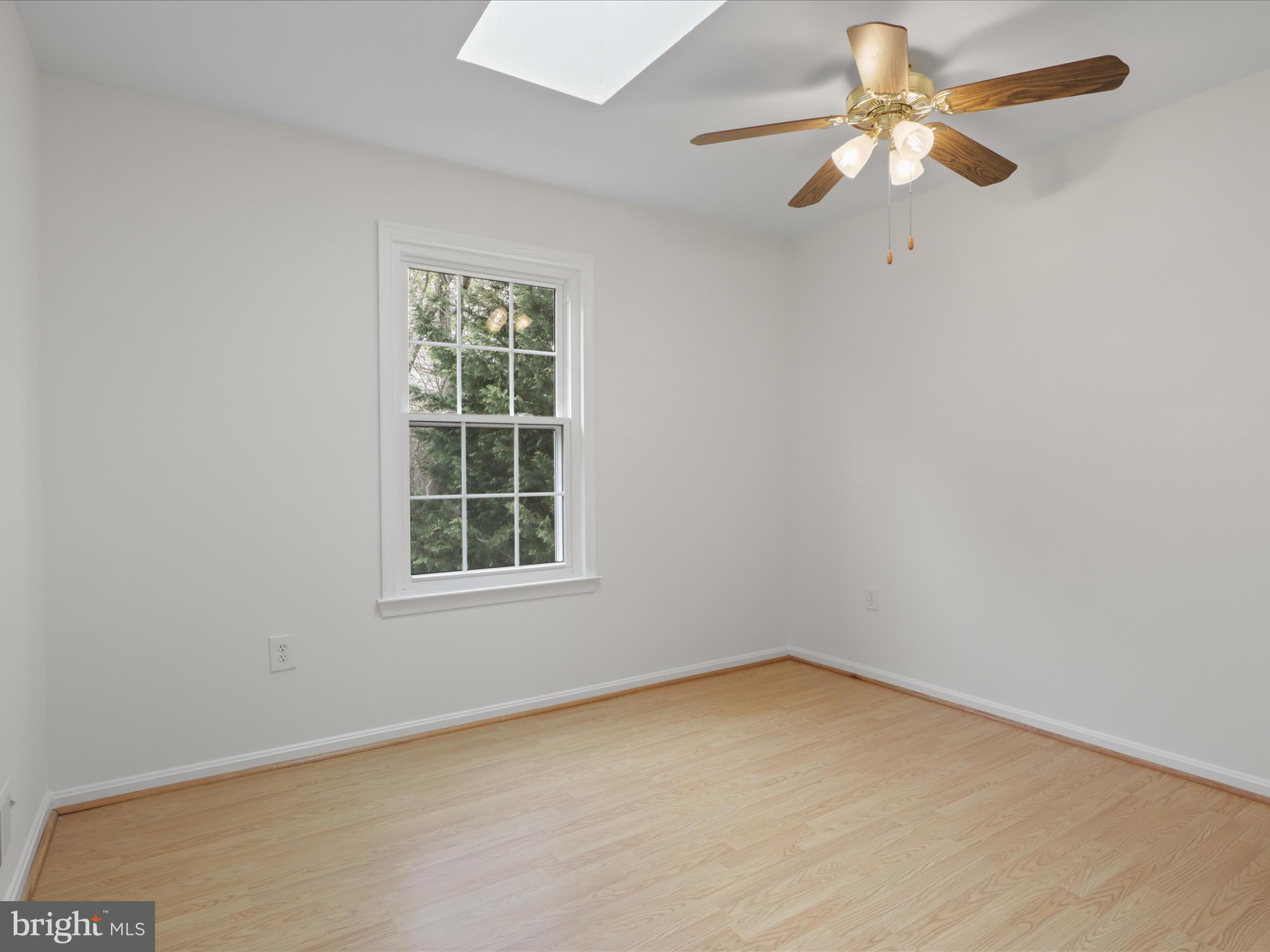332 Silver Ridge Drive Sterling, VA 20164 - Photo 29 of 53 an empty room with a window and a fan