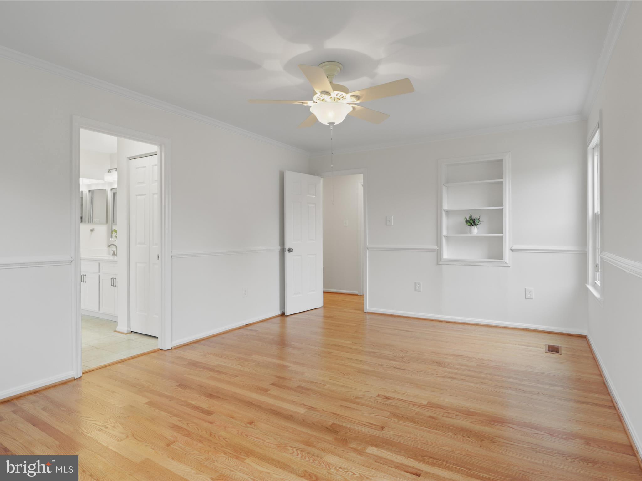 332 Silver Ridge Drive Sterling, VA 20164 - Photo 33 of 53 a view of an empty room with wooden floor