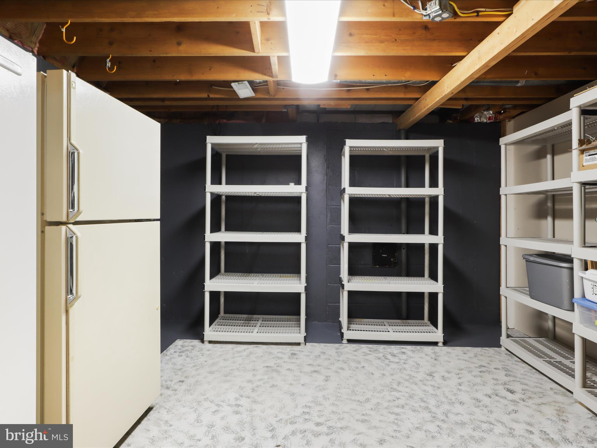 332 Silver Ridge Drive Sterling, VA 20164 - Photo 44 of 53 a view of an empty room with empty shelves