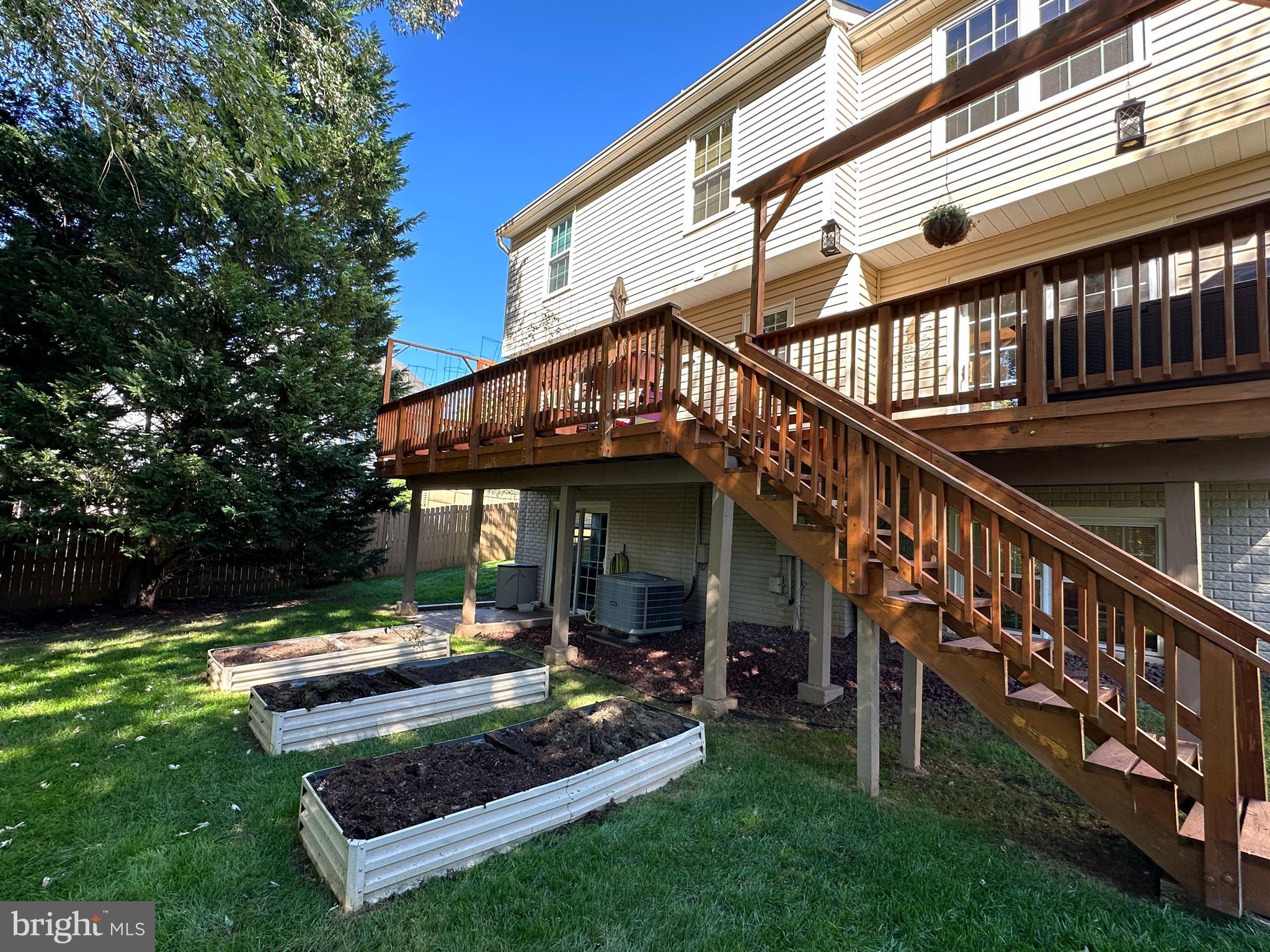 332 Silver Ridge Drive Sterling, VA 20164 - Photo 45 of 53 a view of a house with backyard and porch