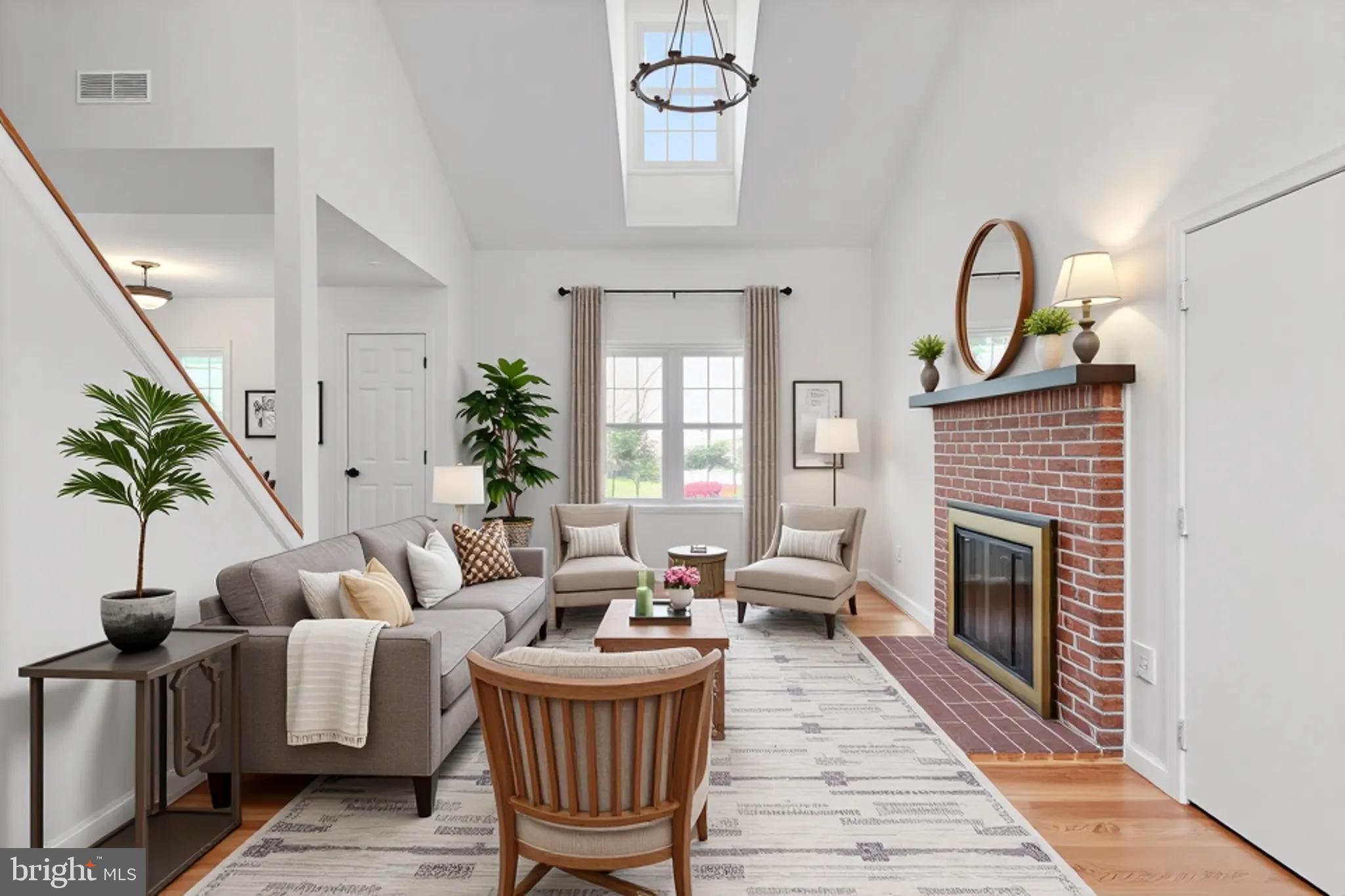 332 Silver Ridge Drive Sterling, VA 20164 - Photo 7 of 53 a living room with furniture a fireplace and potted plants