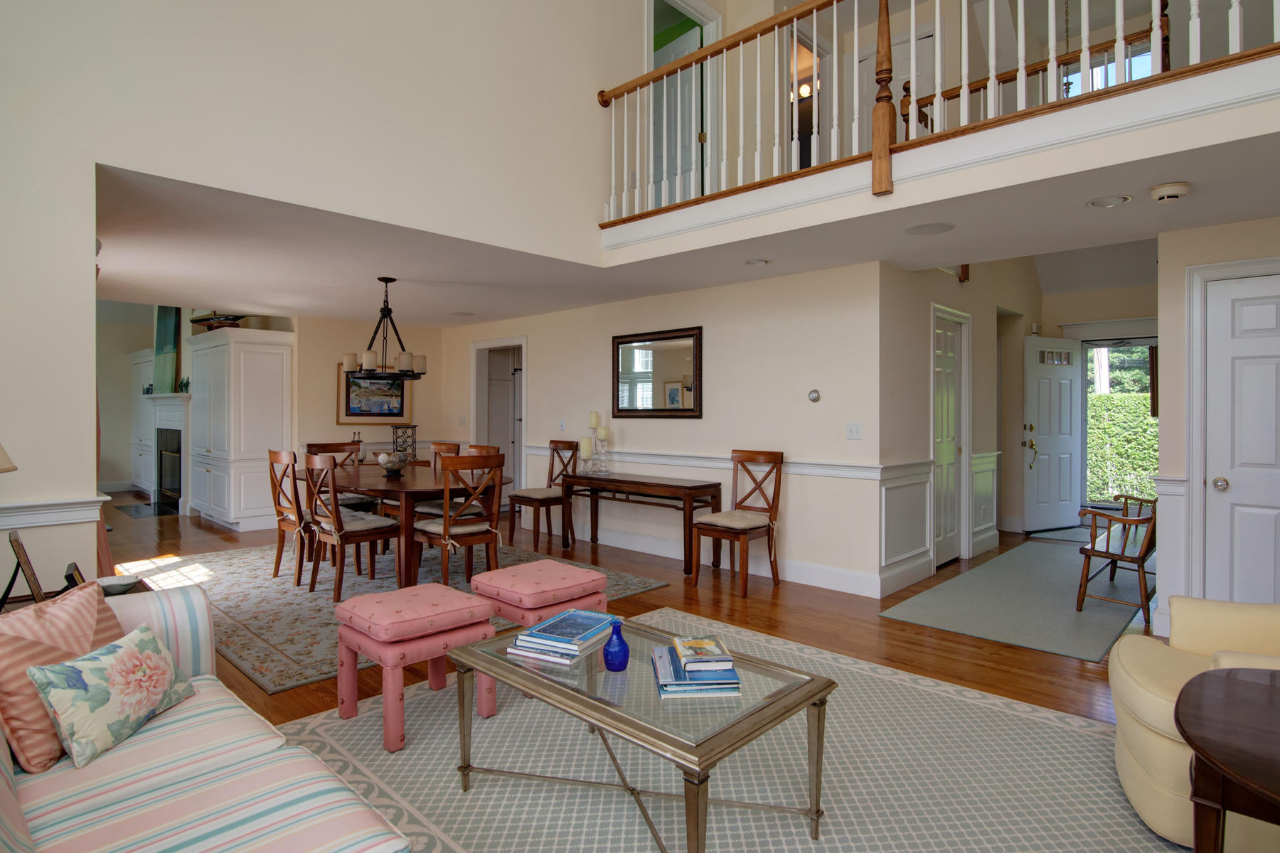 139 West Bay Road Osterville, MA 02655 - Photo 3 of 18 a living room with furniture a wooden floor and a dining table