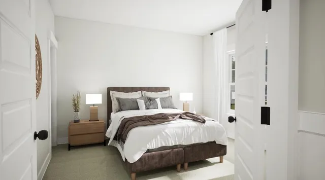 a bedroom with bed and a closet