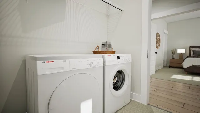 a utility room with dryer and washer