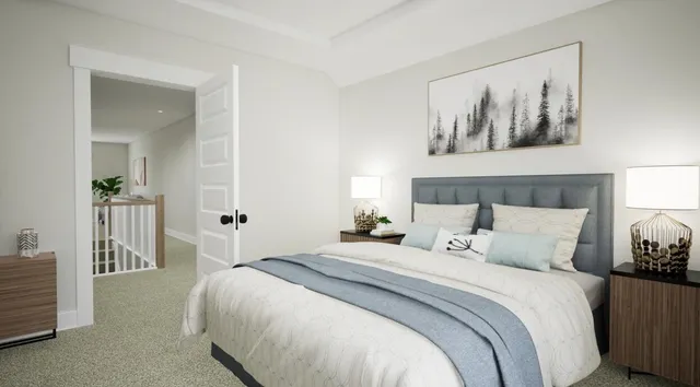 a bedroom with a bed and a painting on the wall