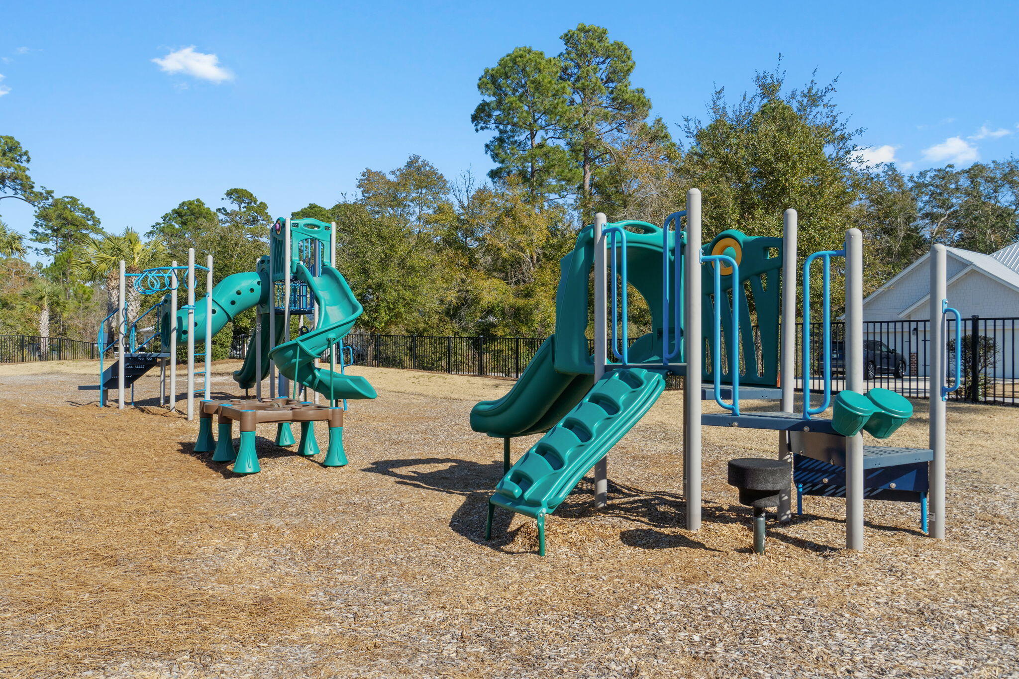 29 Spirit Bear Way Freeport, FL 32439 - Photo 32 of 51 a view of a park with swings and slides
