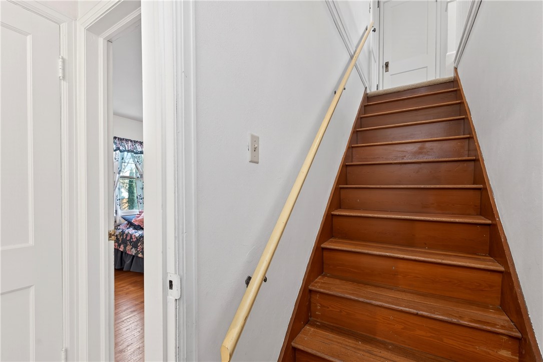 1237 Laurelwood Road Dayton, OH 45409 - Photo 25 of 56 Navigate to the upper level via these sturdy wooden stairs.