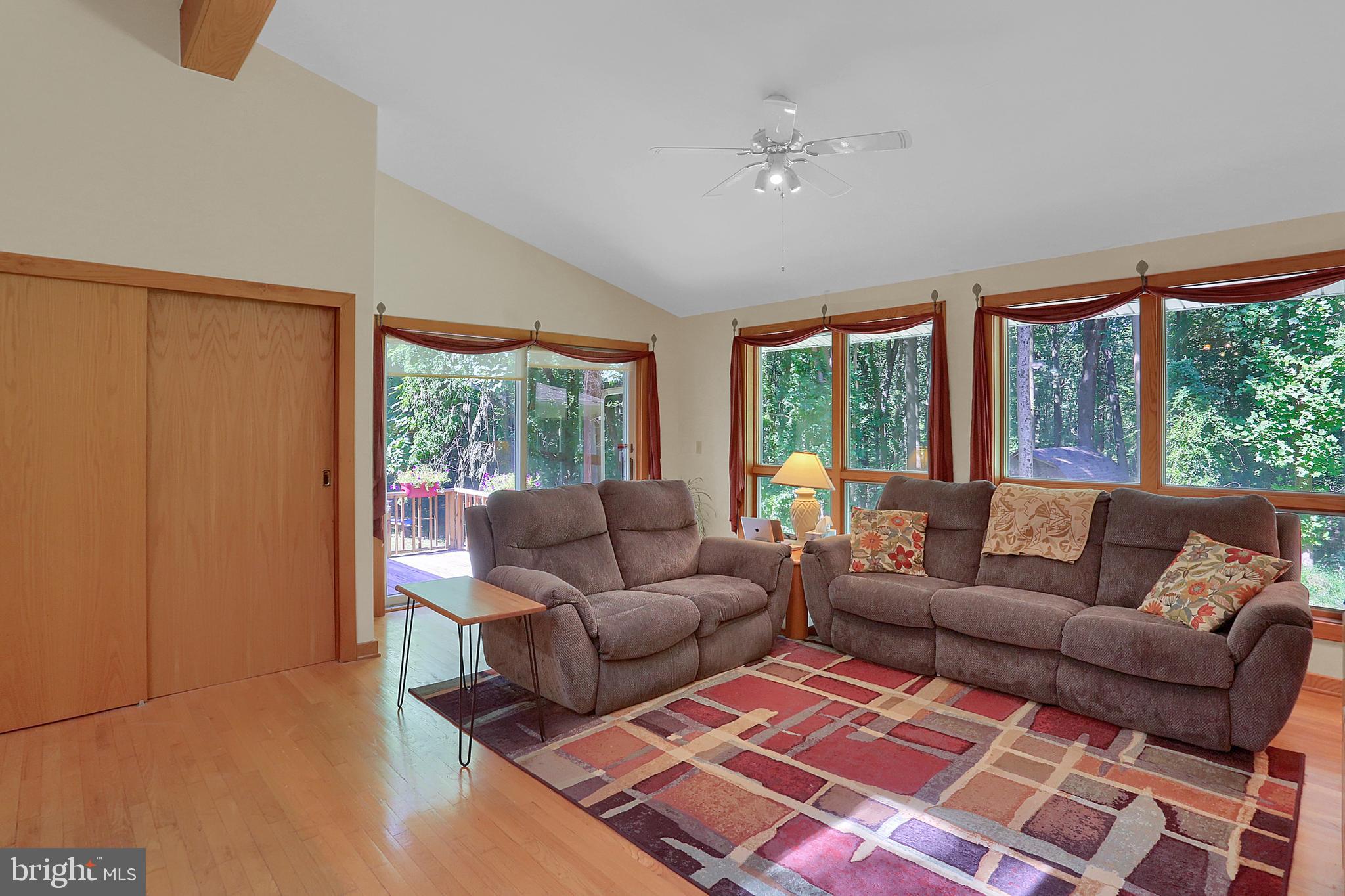 3336 Offutt Road Randallstown, MD 21133 - Photo 17 of 45 a living room with furniture and a large window