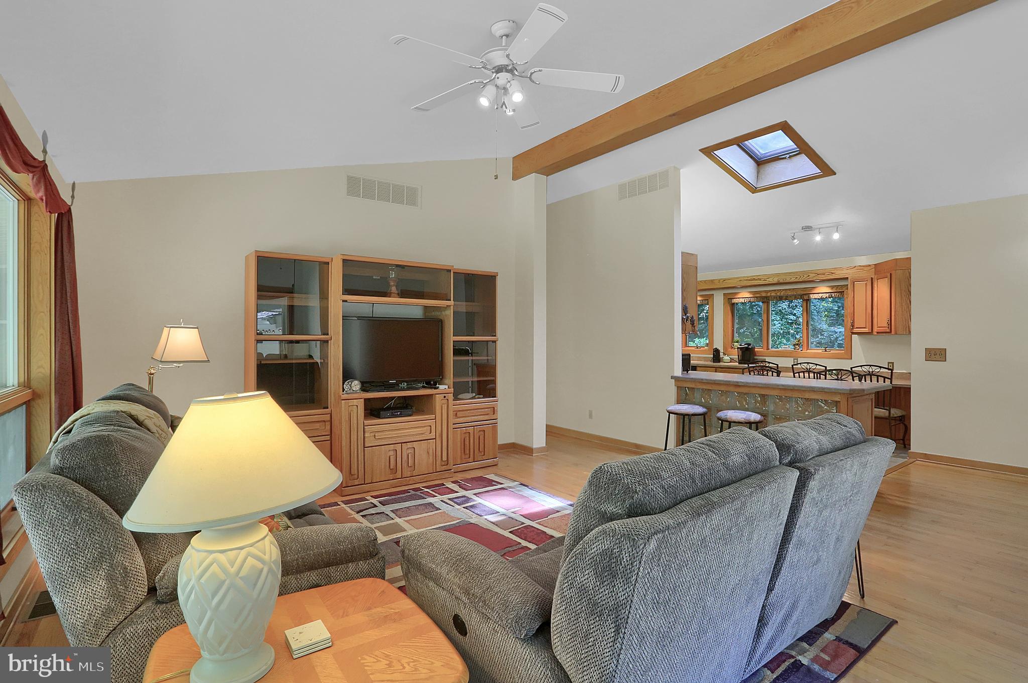 3336 Offutt Road Randallstown, MD 21133 - Photo 19 of 45 a bedroom with a large bed and a large window