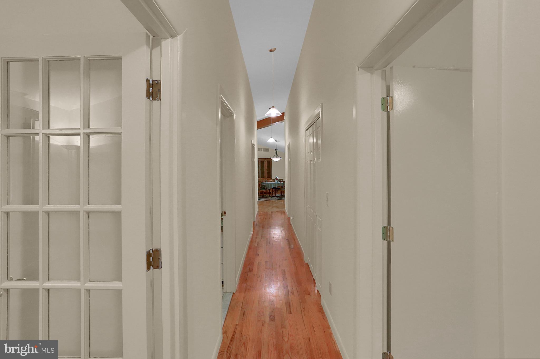 3336 Offutt Road Randallstown, MD 21133 - Photo 33 of 45 a view of a hallway with wooden floor