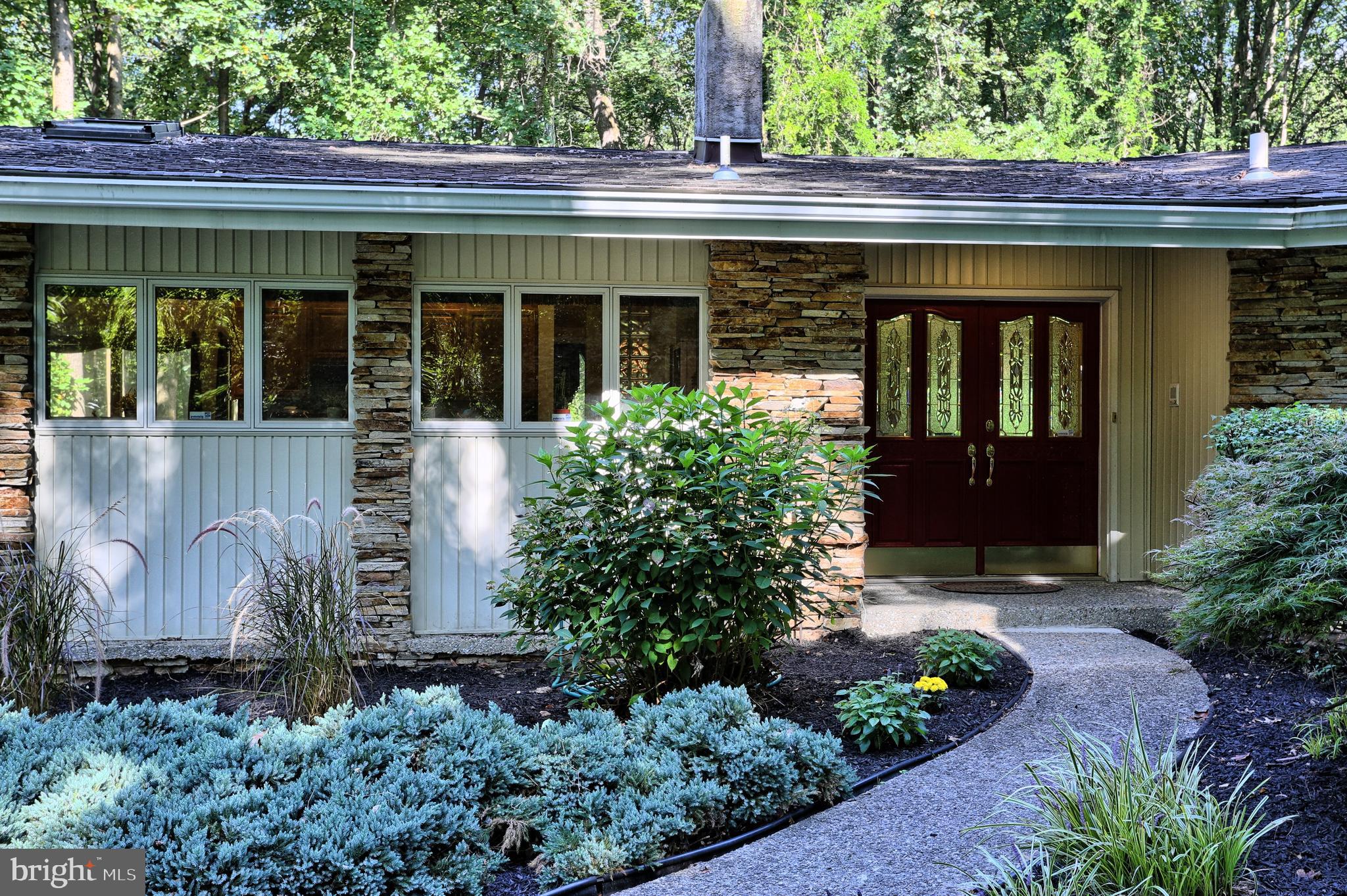 3336 Offutt Road Randallstown, MD 21133 - Photo 35 of 45 a view of a house with a garden