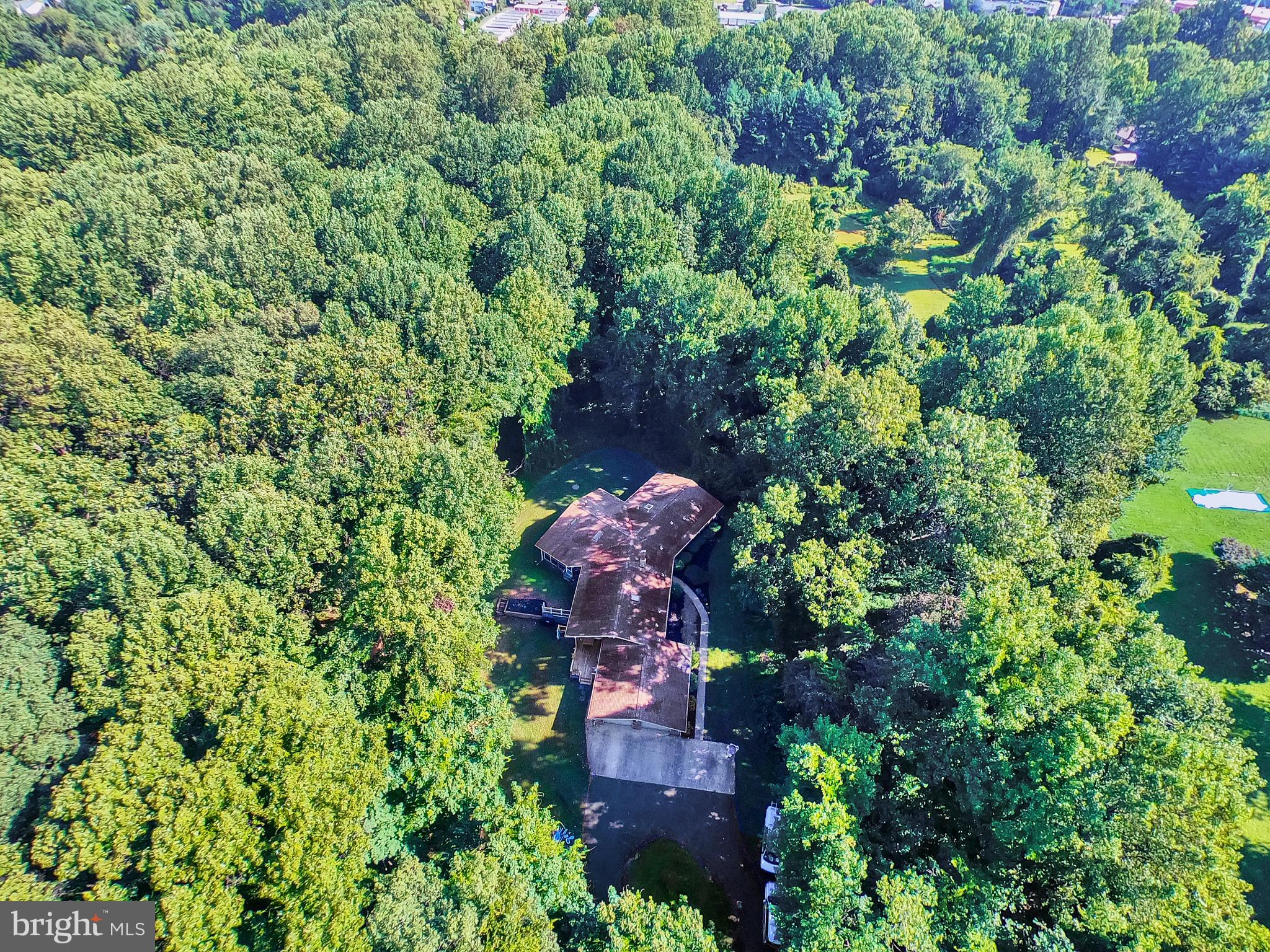3336 Offutt Road Randallstown, MD 21133 - Photo 42 of 45 an aerial view of a house with a yard and garden