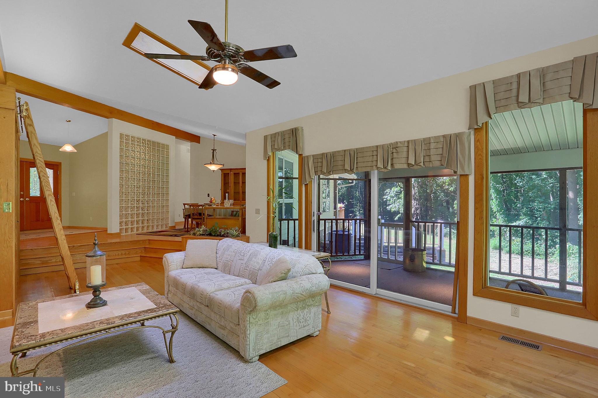 3336 Offutt Road Randallstown, MD 21133 - Photo 6 of 45 a living room with furniture and a large window