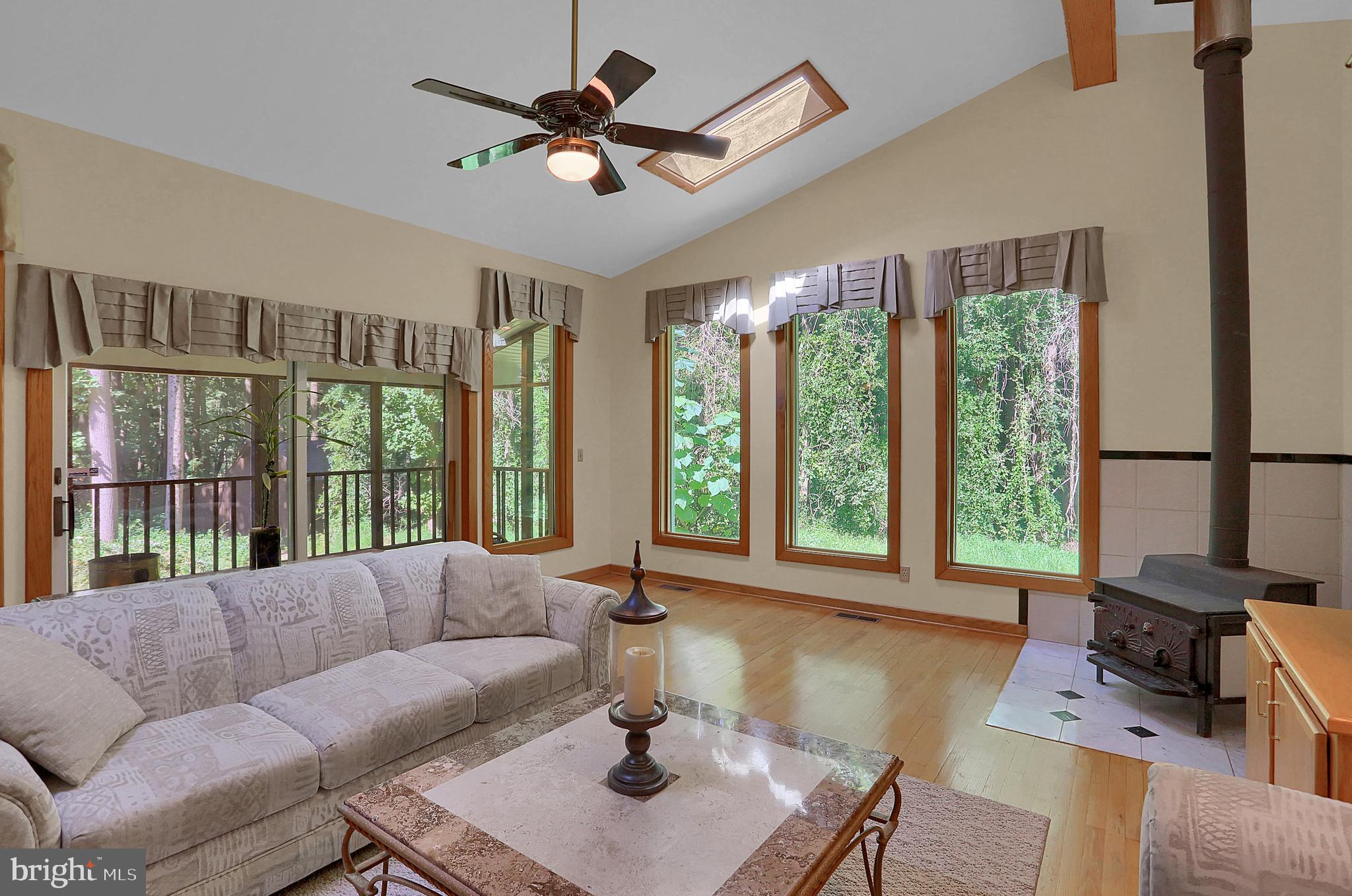 3336 Offutt Road Randallstown, MD 21133 - Photo 7 of 45 a living room with furniture and a large window