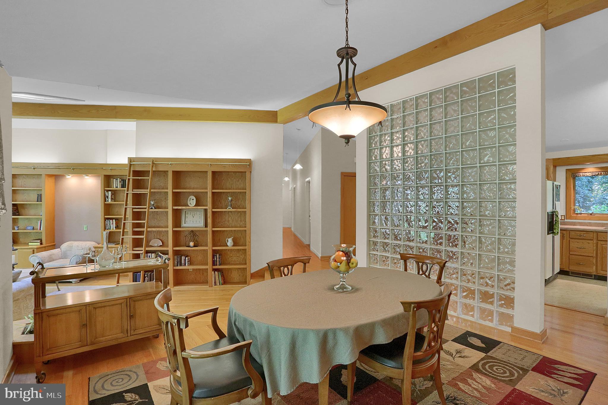 3336 Offutt Road Randallstown, MD 21133 - Photo 10 of 45 a view of a dining room with furniture and chandelier
