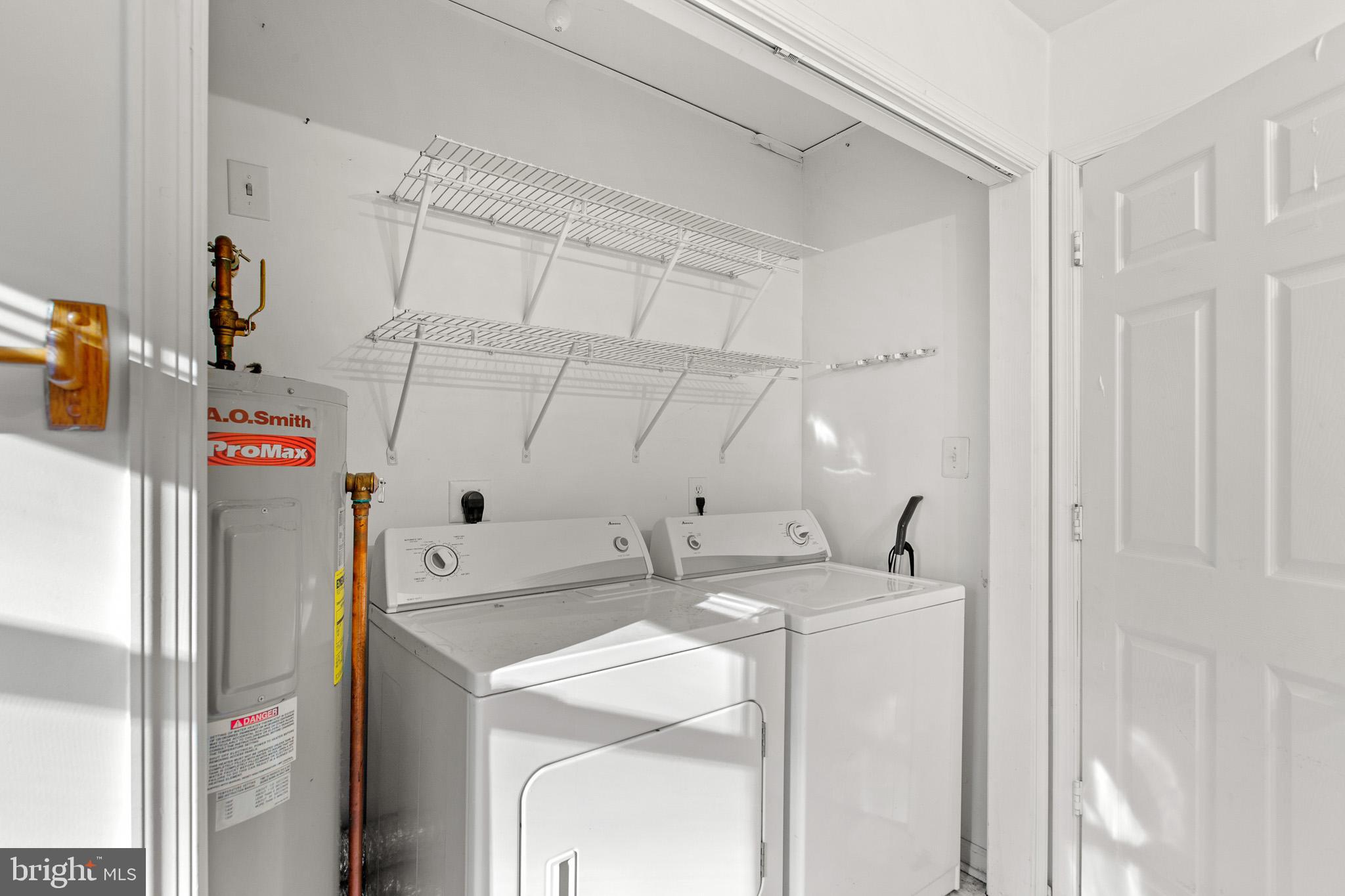 16197 Thomas Road Piney Point, MD 20674 - Photo 7 of 15 a utility room with dryer and washer