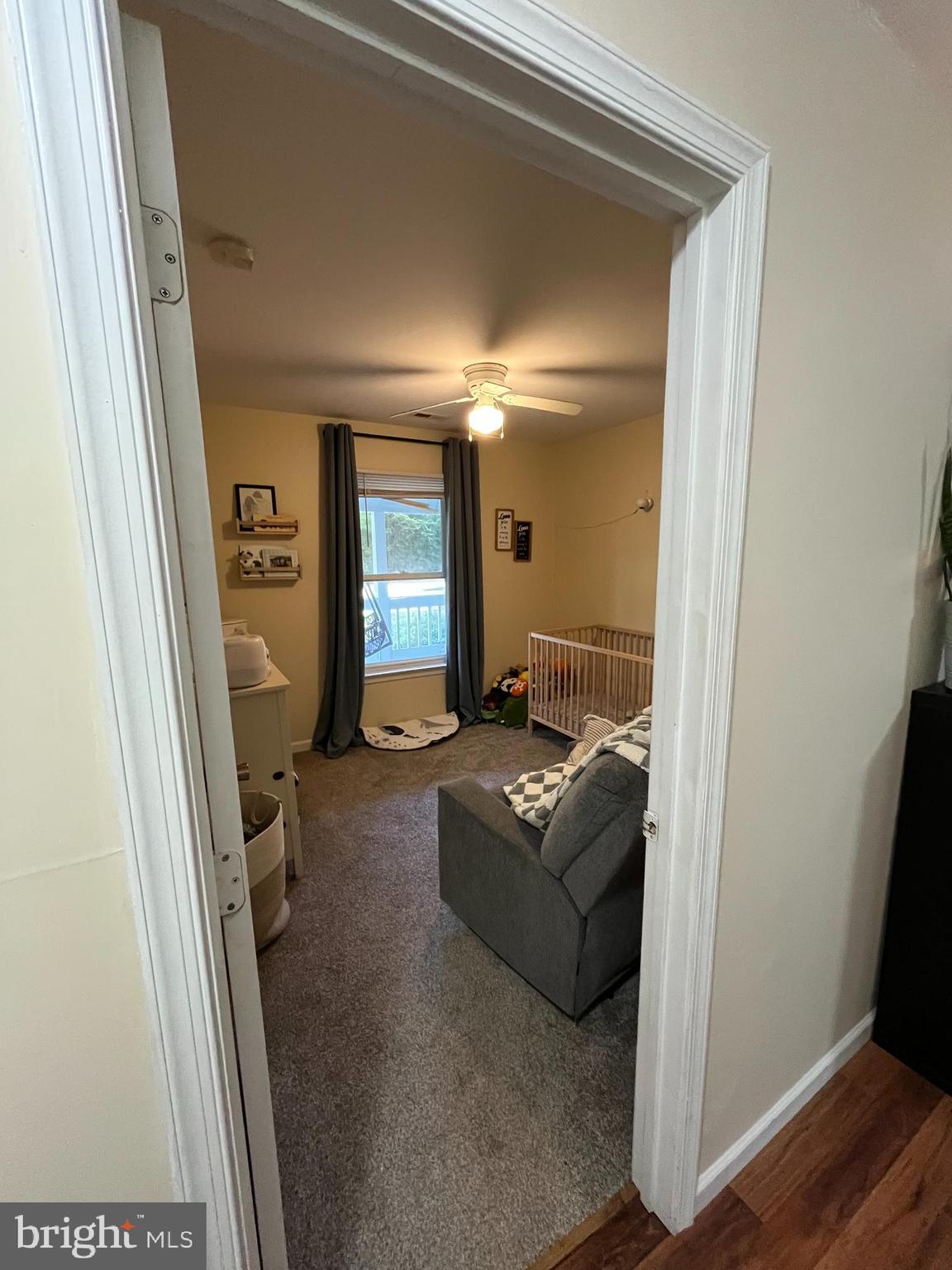 16197 Thomas Road Piney Point, MD 20674 - Photo 10 of 15 a living room with furniture and a gate