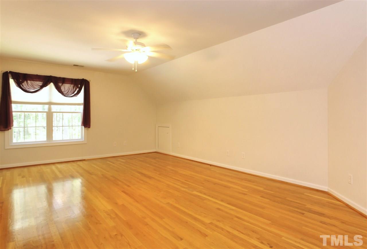 9538 George Ruff Road Bullock, NC 27507 - Photo 14 of 22 a view of an empty room with a window