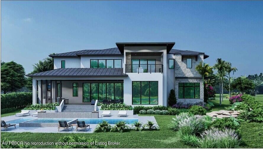 4 Whitney Way Ocean Ridge, FL 33435 - Photo 3 of 13 front view of a house with a yard