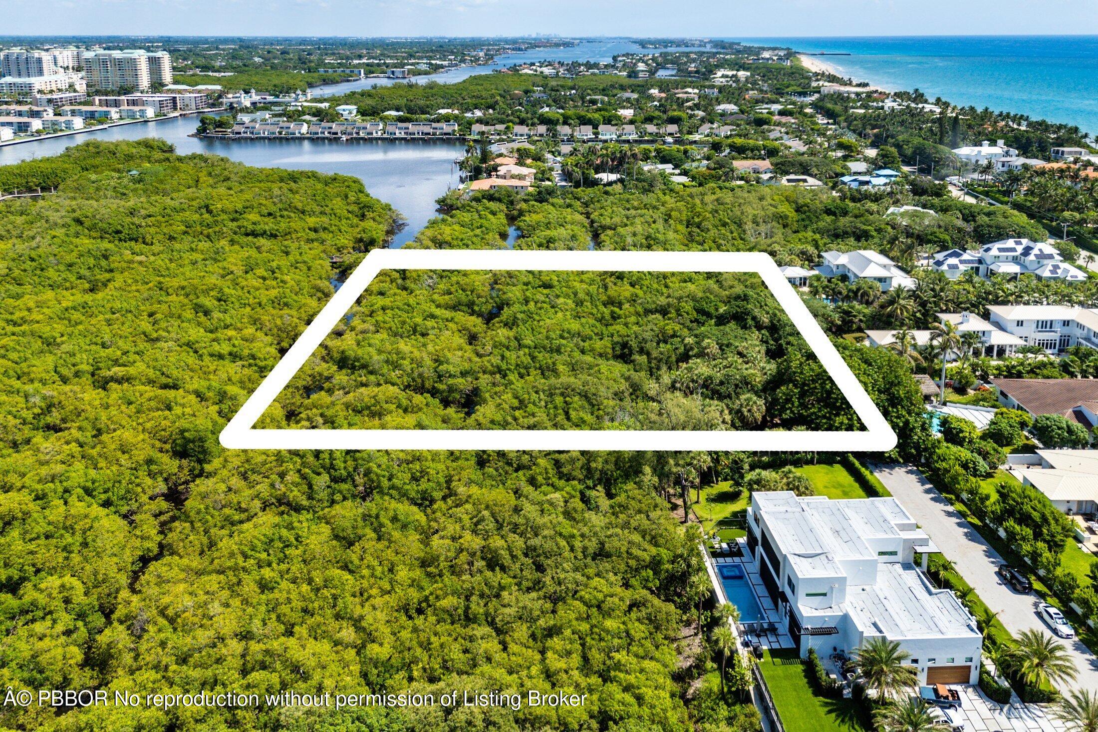 4 Whitney Way Ocean Ridge, FL 33435 - Photo 10 of 13 a view of a lake with a city