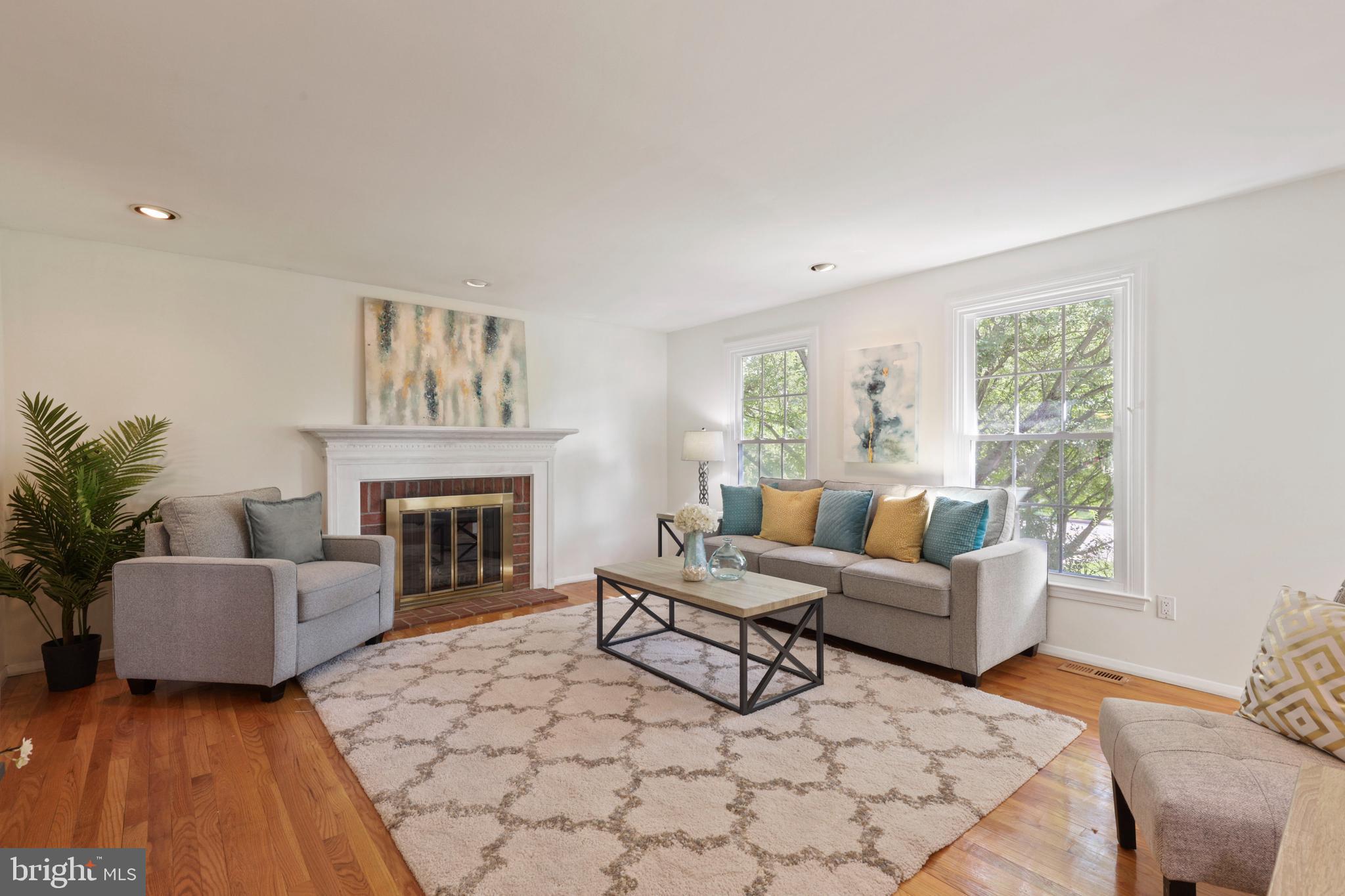 2102 Pot Spring Road Lutherville-Timonium, MD 21093 - Photo 7 of 43 Living room with wood burning fireplace