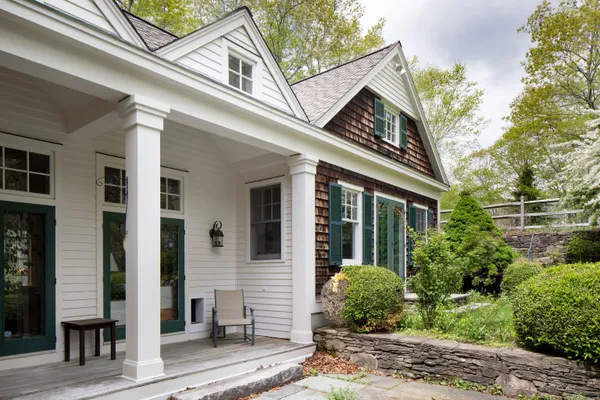 a view of a house with a garden