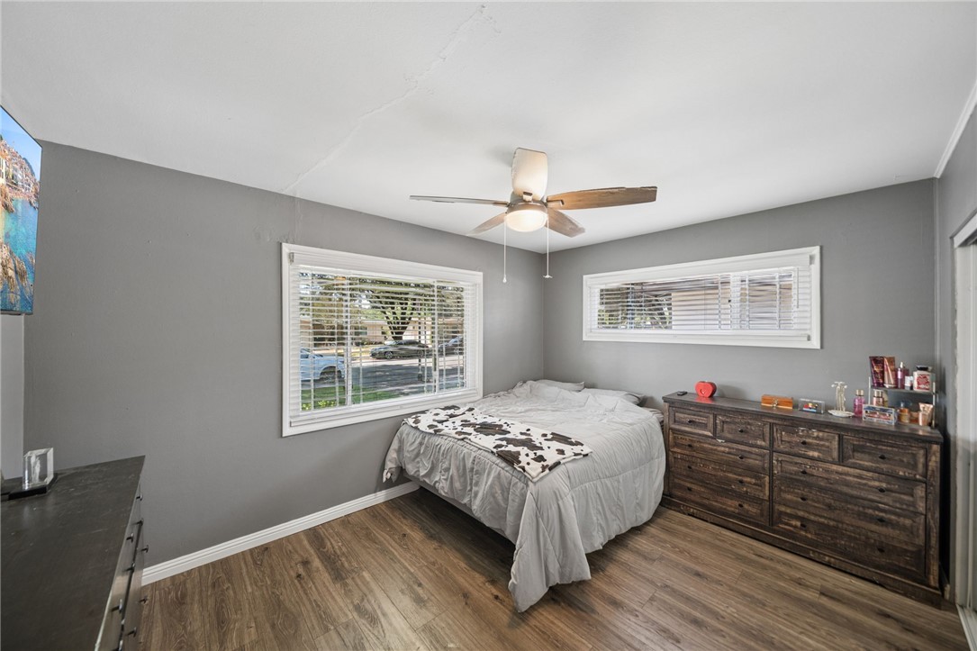 4869 Serrano Place Riverside, CA 92504 - Photo 17 of 40 Spacious bedroom with large windows, abundant natural light, neutral tones, and generous space for furniture and flexible use.
