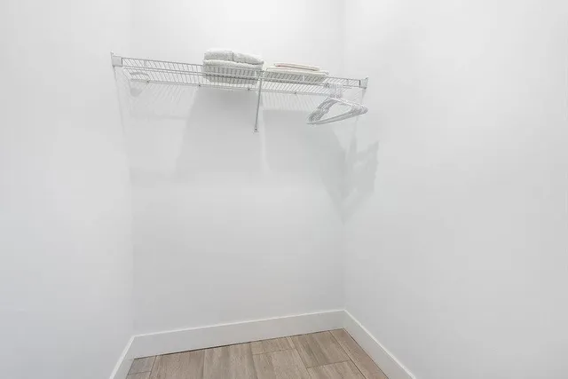 a view of a room with racks on the wall