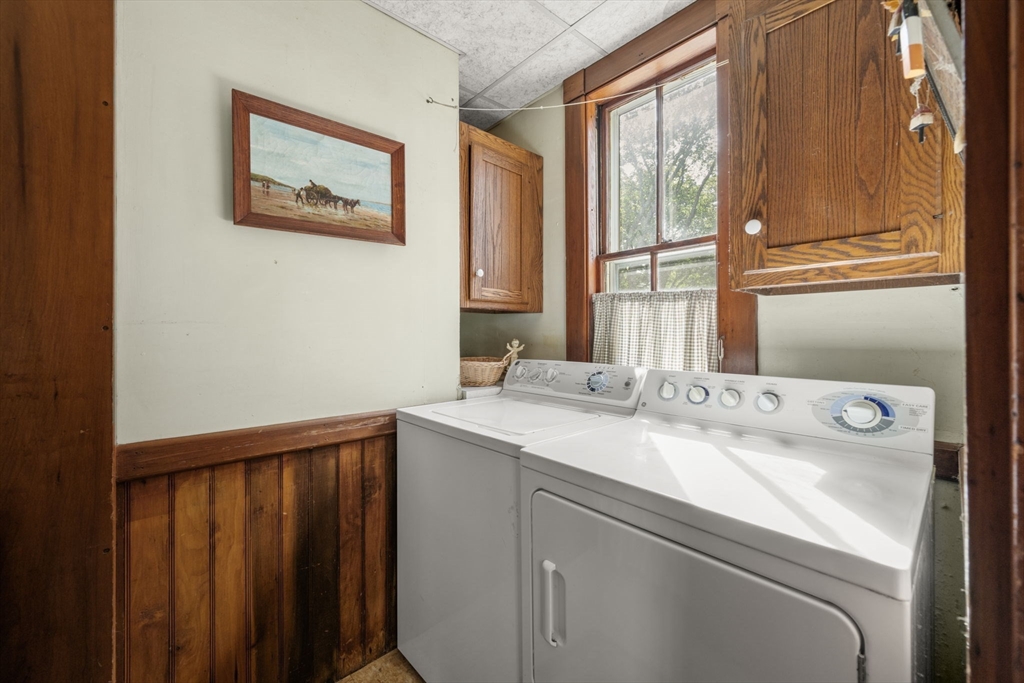 66 Jersey Street Marblehead, MA 01945 - Photo 21 of 31 a bathroom with a granite countertop sink and a window