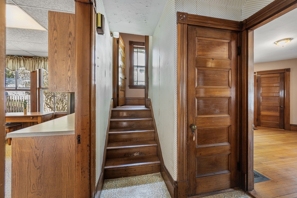 66 Jersey Street Marblehead, MA 01945 - Photo 22 of 31 a view of a hallway with wooden floor and entryway