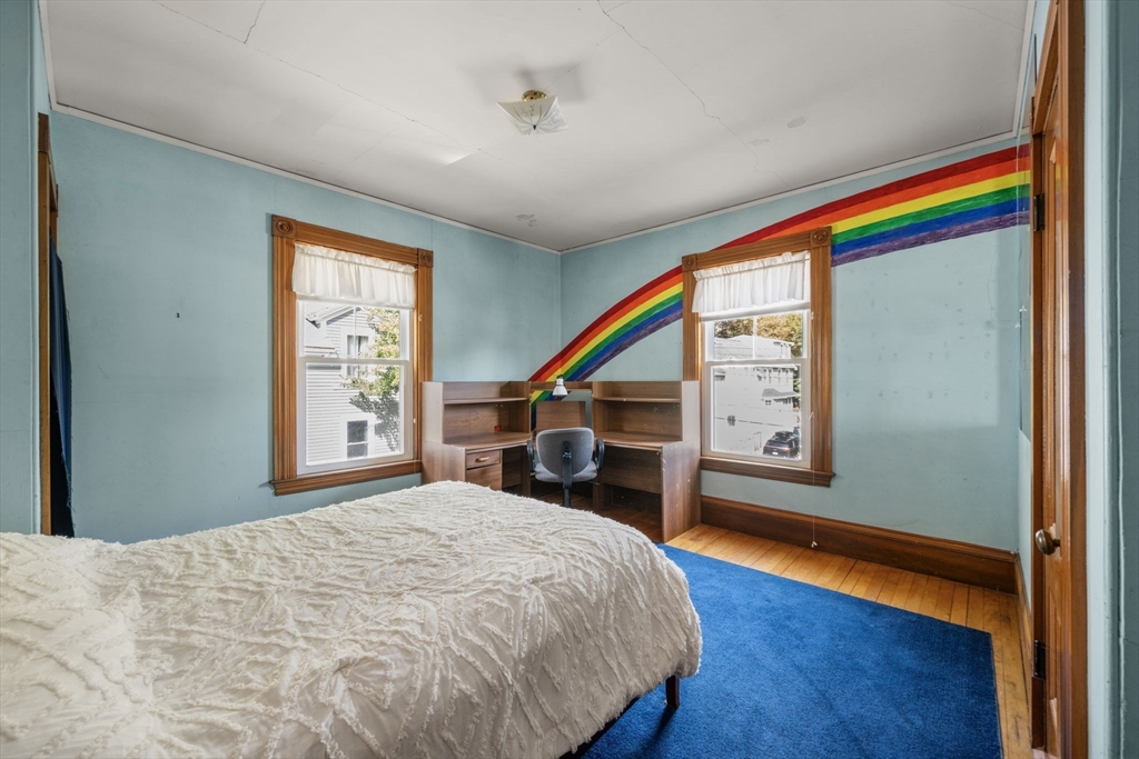 66 Jersey Street Marblehead, MA 01945 - Photo 23 of 31 a bedroom with a bed and a window