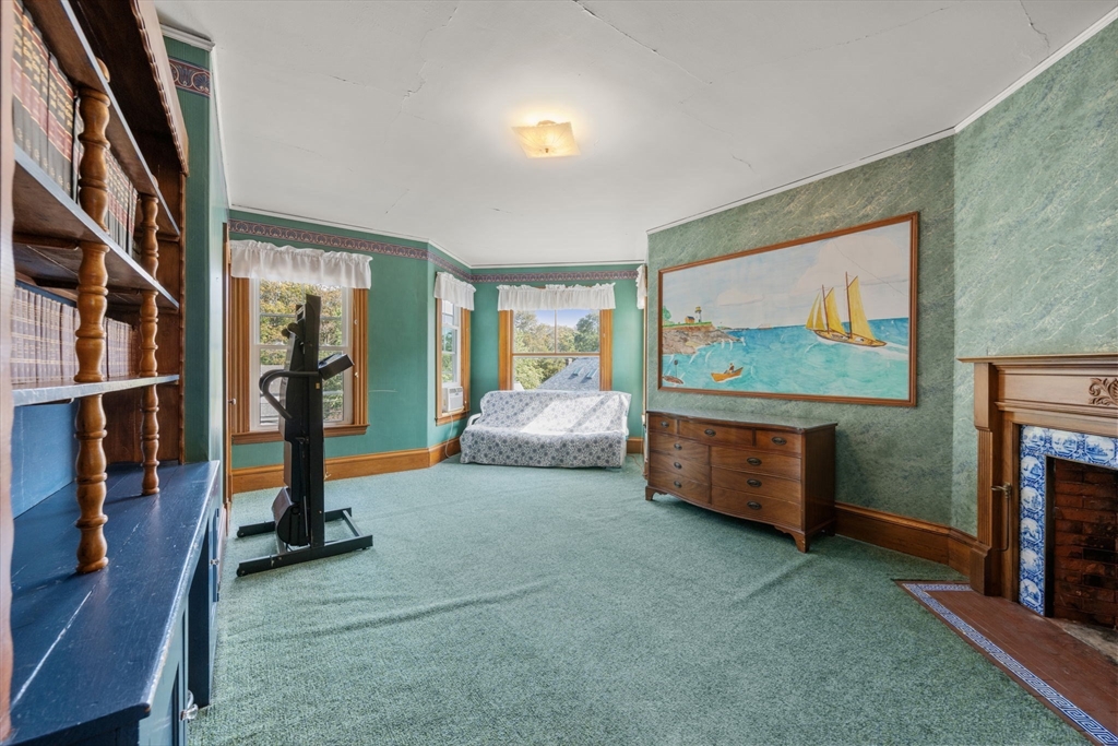66 Jersey Street Marblehead, MA 01945 - Photo 24 of 31 a living room with furniture and a flat screen tv