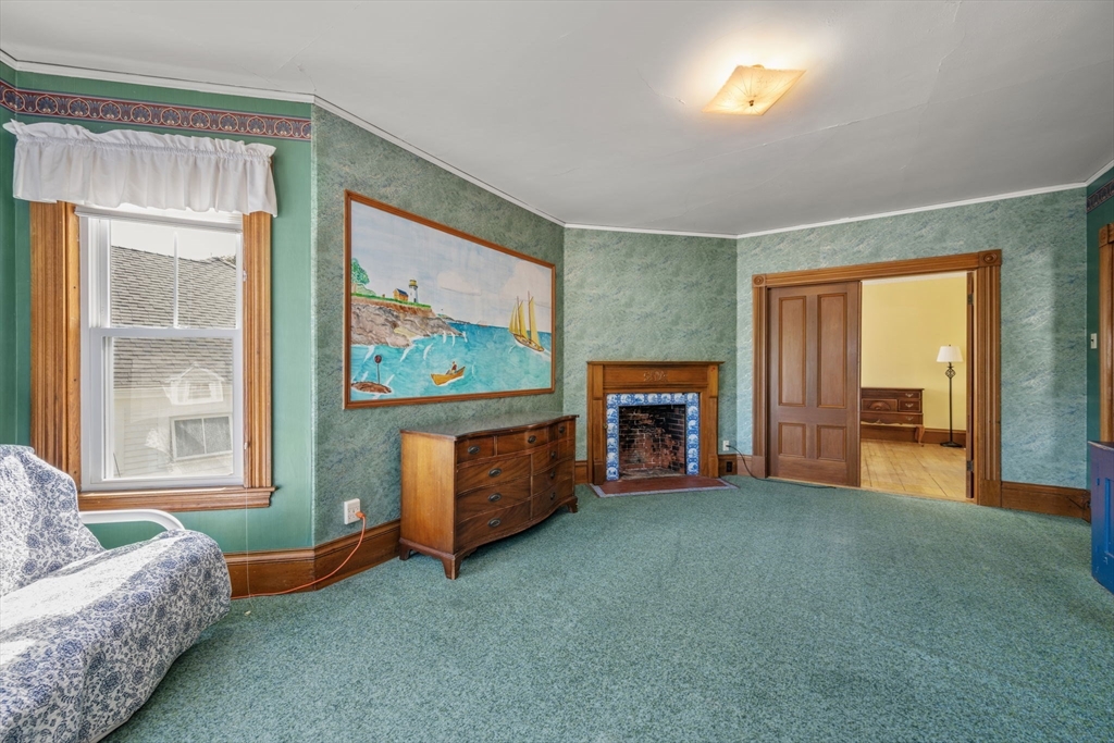 66 Jersey Street Marblehead, MA 01945 - Photo 25 of 31 a living room with furniture and a flat screen tv