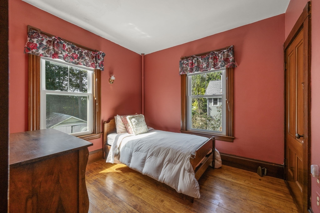 66 Jersey Street Marblehead, MA 01945 - Photo 29 of 31 a bedroom with a bed and window
