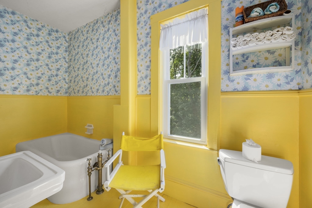 66 Jersey Street Marblehead, MA 01945 - Photo 30 of 31 a bathroom with a sink and a bathtub