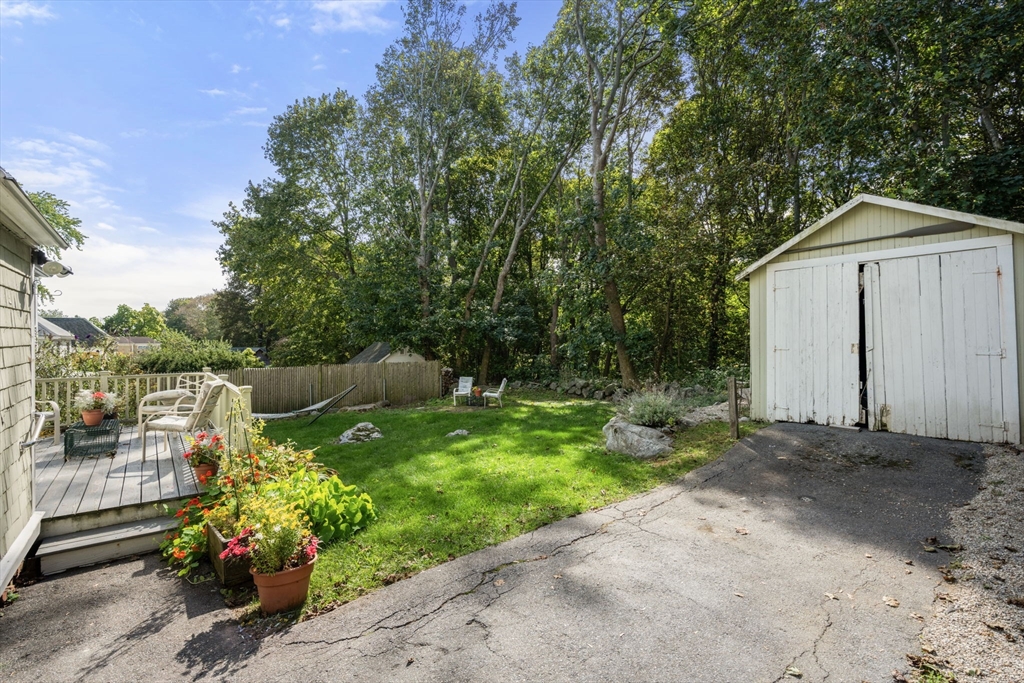 66 Jersey Street Marblehead, MA 01945 - Photo 3 of 31 a view of backyard with outdoor seating and green space