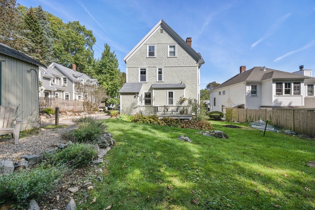 66 Jersey Street Marblehead, MA 01945 - Photo 5 of 31 a front view of a house with a yard