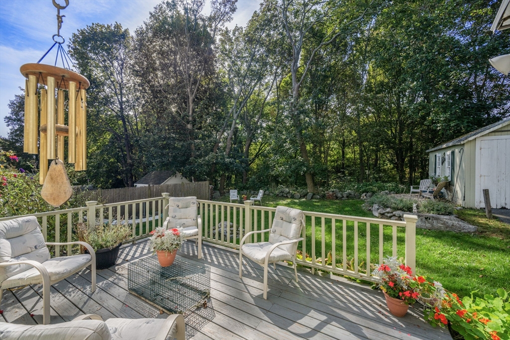 66 Jersey Street Marblehead, MA 01945 - Photo 7 of 31 a view of a chair and tables front of the house