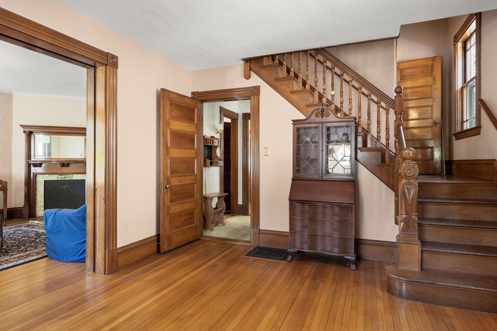66 Jersey Street Marblehead, MA 01945 - Photo 10 of 31 an empty room with wooden floor and windows