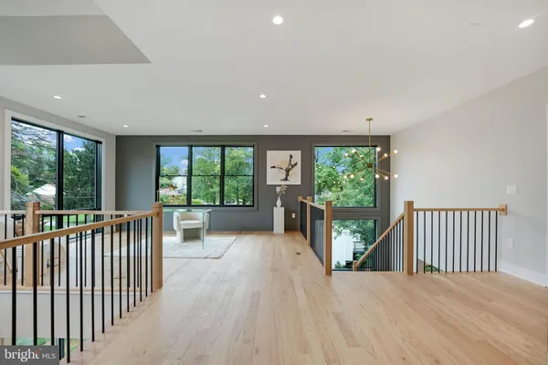 a spacious bedroom with a large bed and a couch