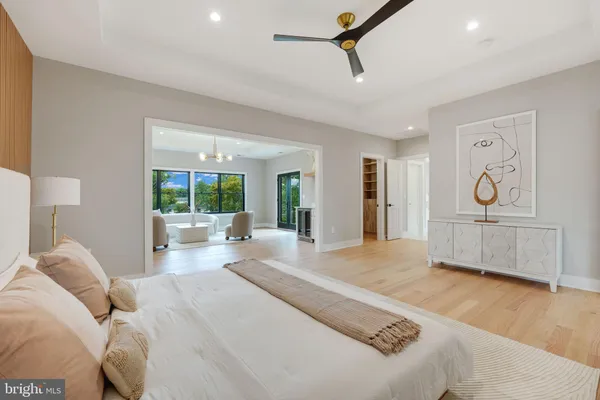 a large spacious bathroom with a large tub shower and sink