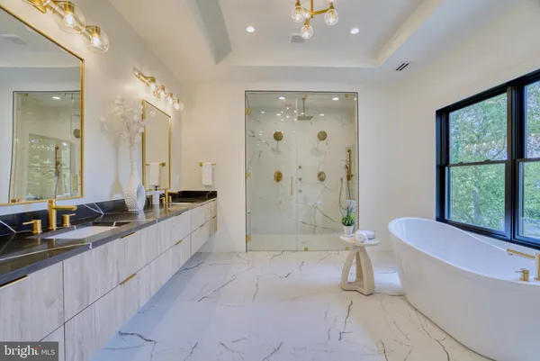 an empty room with floor to ceiling window and wooden floor