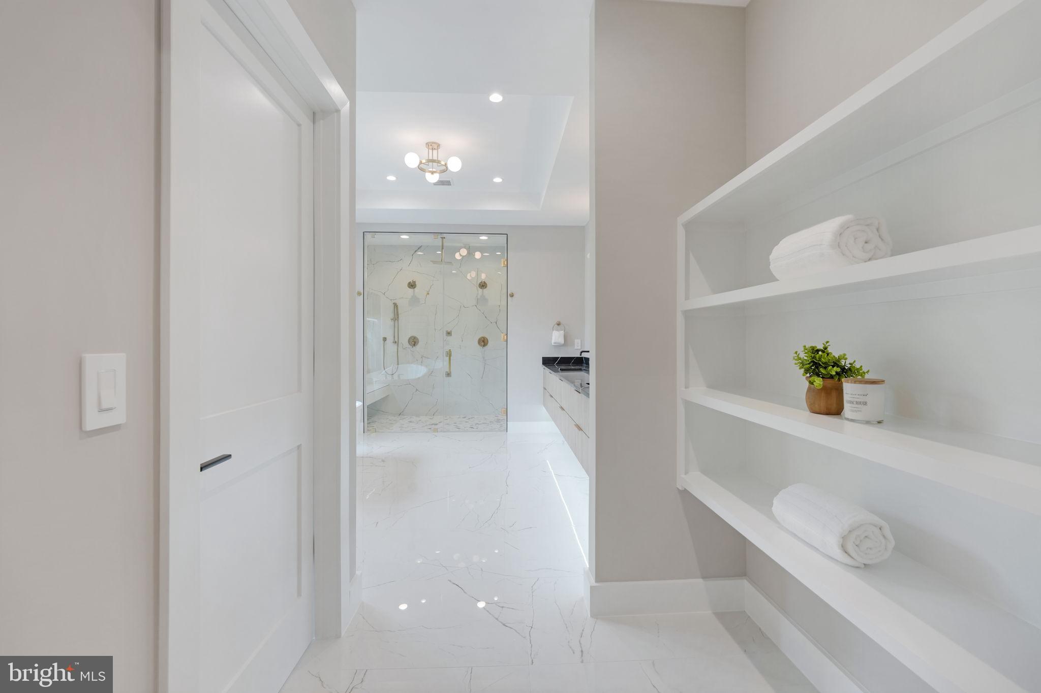 7925 Falstaff Road McLean, VA 22102 - Photo 43 of 58 Owner's suite linen closet (from other build)