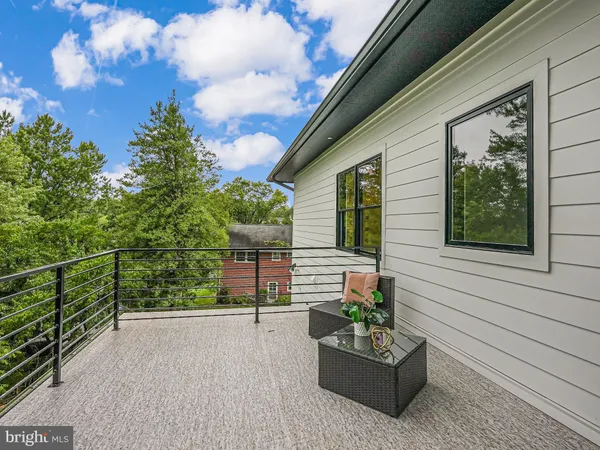 an empty room with a empty space and windows