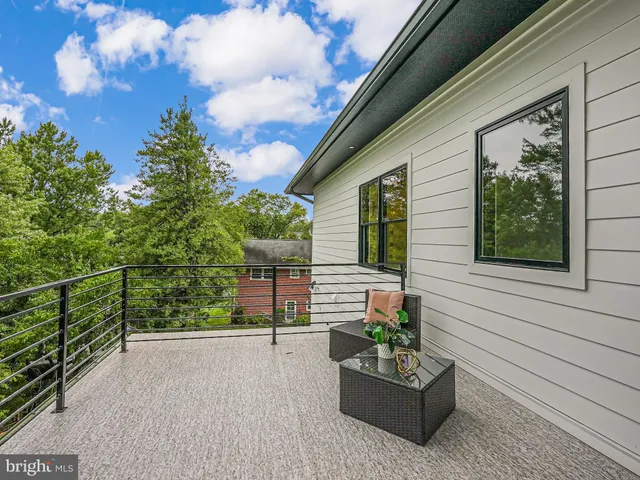 an empty room with a empty space and windows