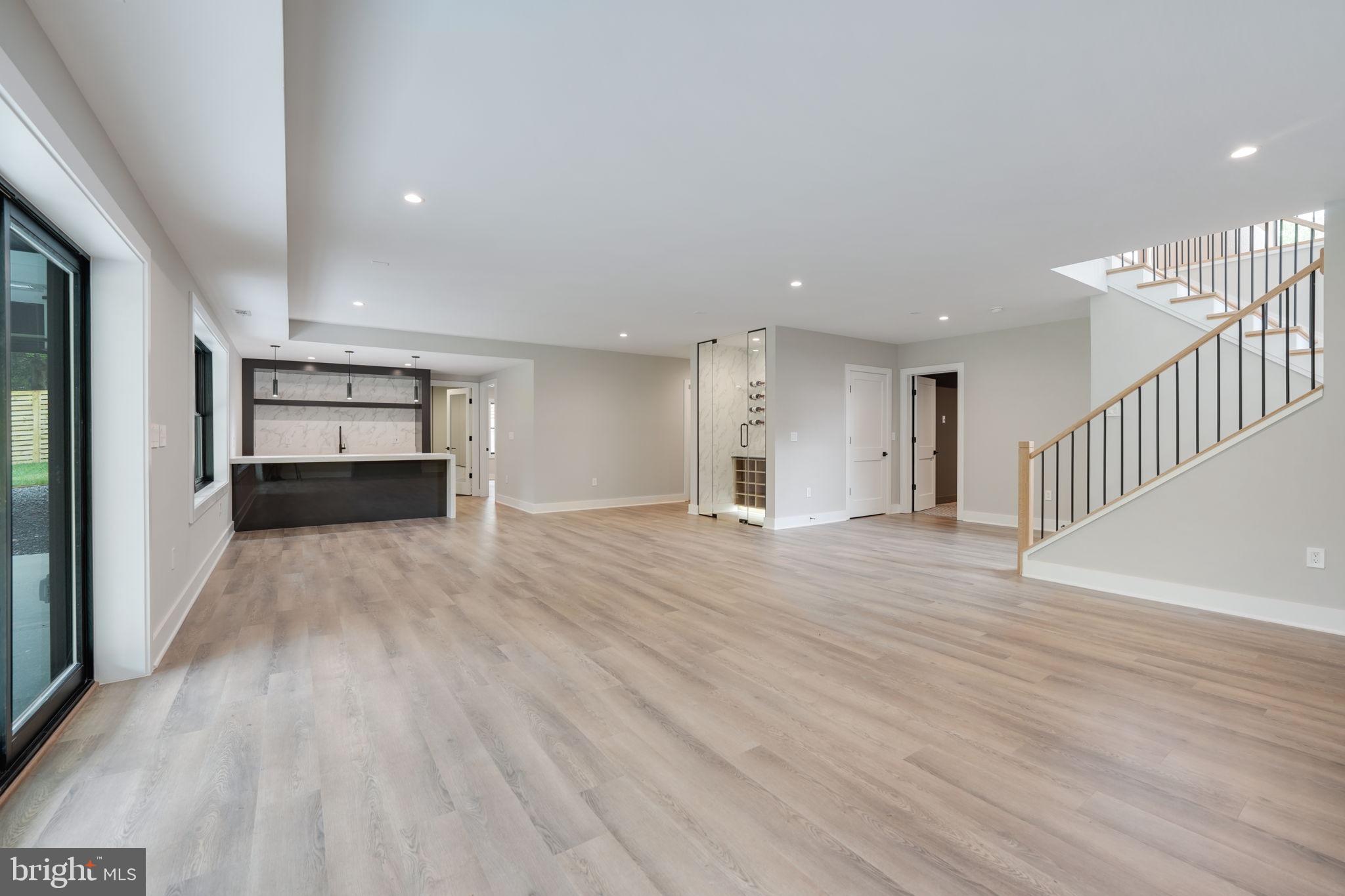 7925 Falstaff Road McLean, VA 22102 - Photo 47 of 58 a view of empty room with wooden floor